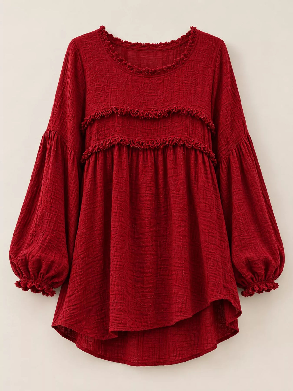 Red peplum blouse front with frayed neckline trim and tiered ruffle bands