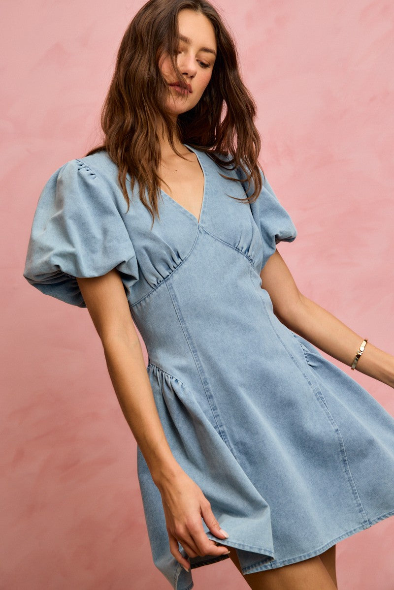 Light denim fit-and-flare mini dress with V-neck and bubble sleeves, short skirt detail