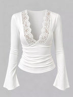 White lace-trim V-neck long sleeve tee with scalloped lace cups and flared sleeves.