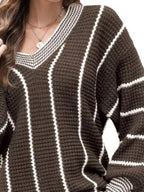 Brown V-neck textured knit sweater with white vertical stripe design and ribbed sleeve cuffs
