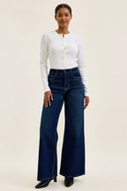 Dark wash wide-leg jeans front view with classic pockets and belt loops