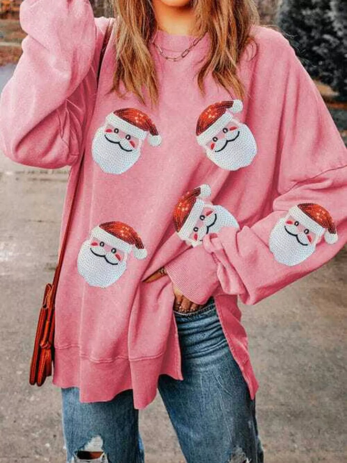 Oversized pink sweatshirt with Santa face graphic print and long sleeves