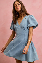 Light wash denim mini dress with V-neck, bubble sleeves, and A-line skirt