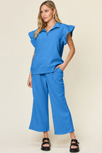 Blue ruffle-sleeve top and wide-leg pants set with matching top and pant waistband