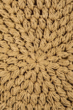 Braided straw weave texture in tan with a round medallion pattern