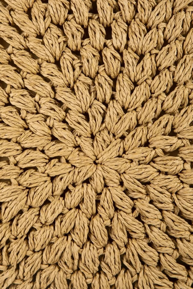 Braided straw weave texture in tan with a round medallion pattern