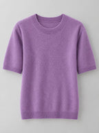 Lavender round-neck short-sleeve sweater with ribbed neckline, hem, and cuffs