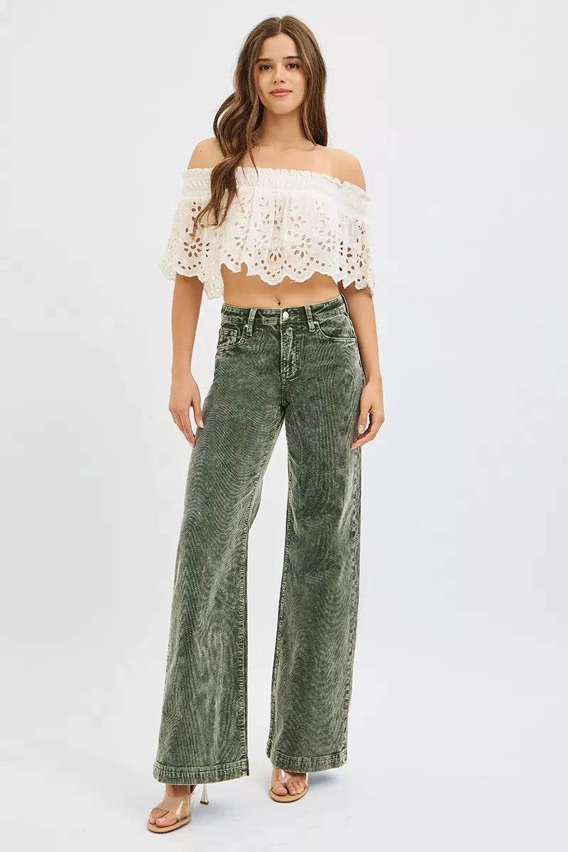 Forest green corduroy high-rise wide-leg jeans on model, full front view