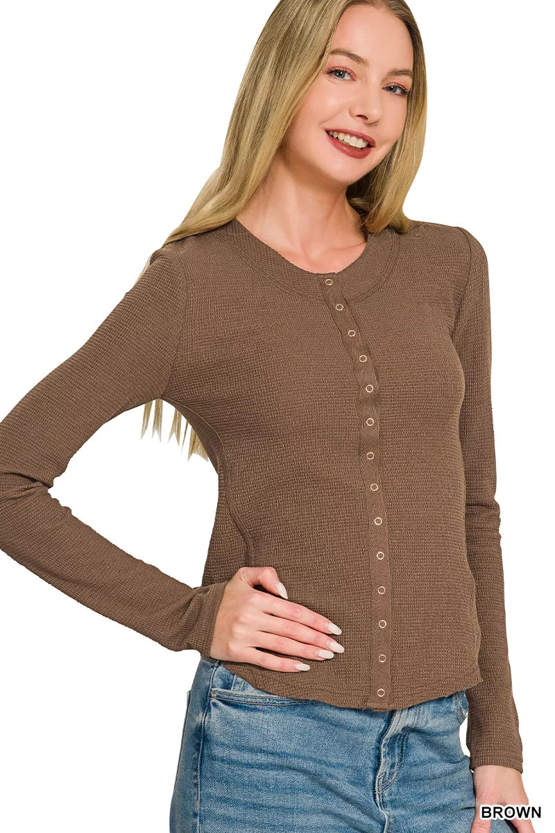 Brown long-sleeve snap-button shirt, crew neckline and curved hem