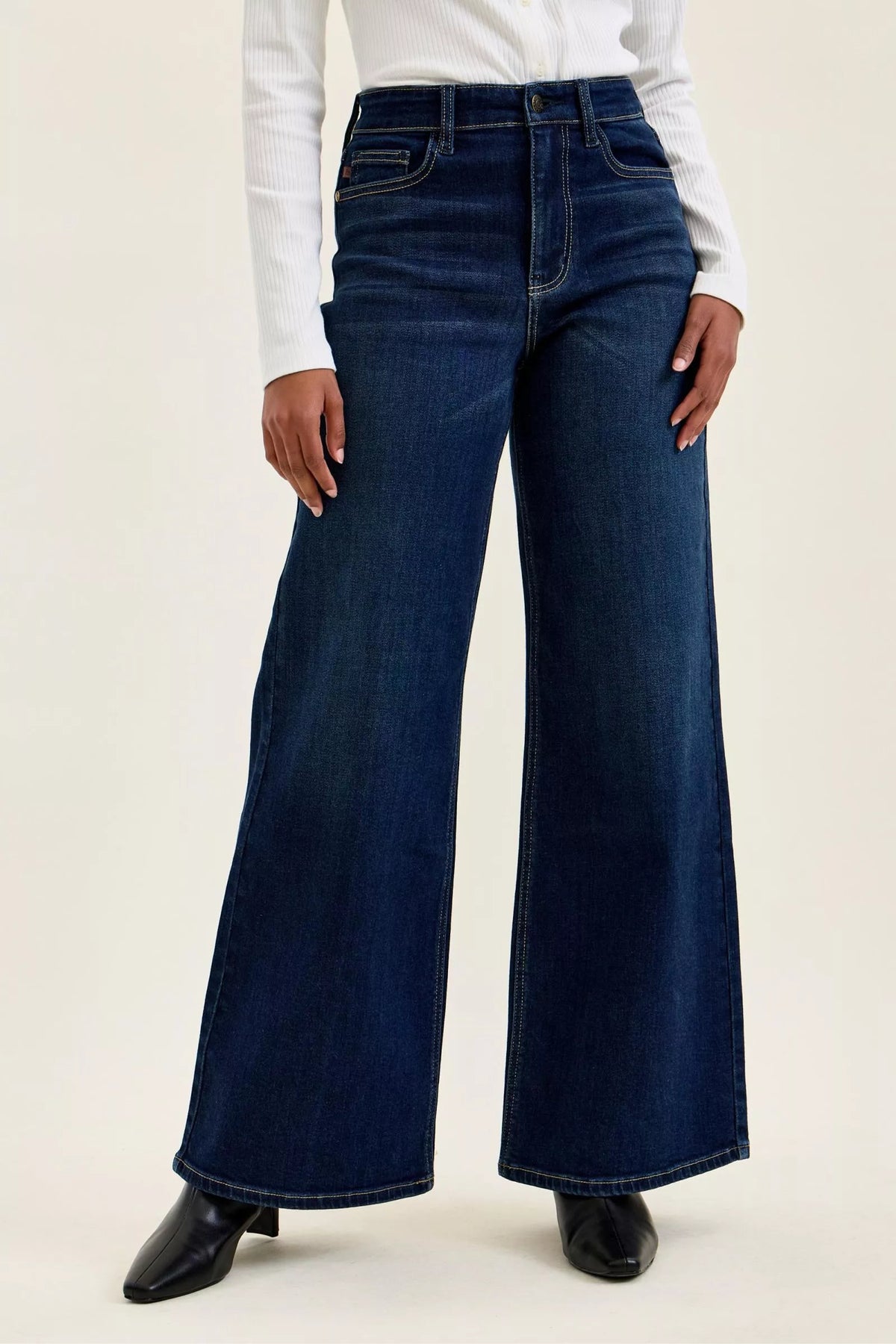 Dark wash wide-leg jeans with high-rise waistband and front belt loops