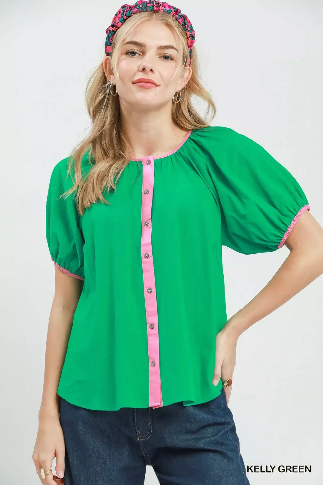 Green puff-sleeve blouse with pink contrast trim and button front