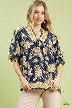 Navy floral boho rayon blouse with V-neck and short gathered sleeves