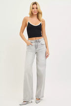 Light grey baggy jeans, relaxed fit, contrast-stitched seams, wide straight legs