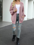 Chunky knit lantern sleeve cardigan in dusty rose, open front with long sleeves.