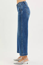 High-rise wide-leg blue denim jeans, side view with back yoke seam