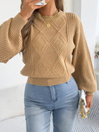 Khaki argyle sweater with long lantern sleeves, crew neck, and ribbed trim