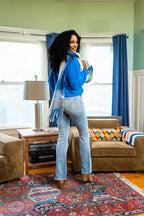 Mid-rise thermal bootcut jeans in light wash denim, straight waistband and belt loops