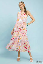 Light pink halter midi dress with tiered skirt and colorful abstract fruit and star print
