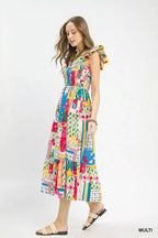Multi-color abstract print tiered midi dress with smocked bodice and ruffled shoulders