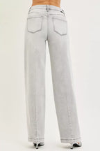Light grey baggy jeans with two back pockets and belt loops, relaxed wide legs