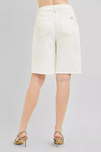 Cream floral-embroidered denim bermuda shorts with pocket embroidery and frayed hem