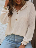 Cream waffle-knit button hoodie with hood, long sleeves, and drawstring details