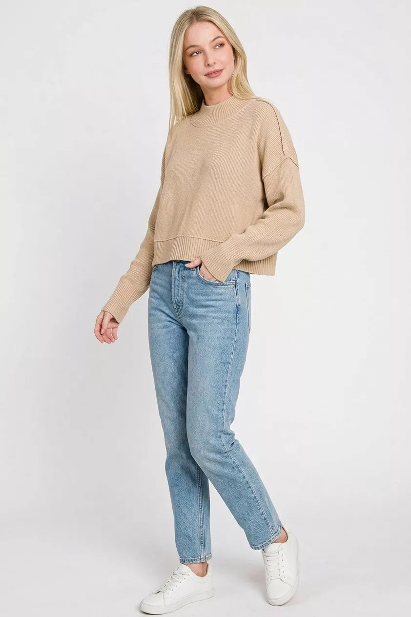 Women’s light mocha cropped knit sweater with long sleeves and ribbed hem