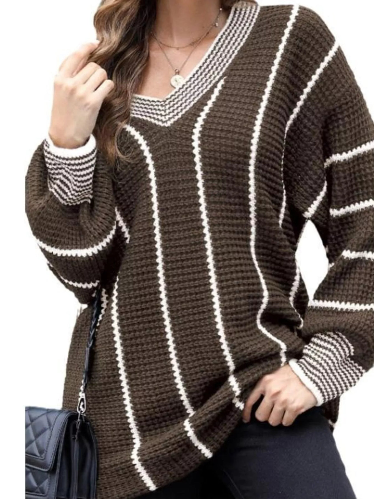 Brown V-neck textured knit sweater with bold white vertical stripes and ribbed cuffs