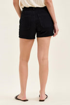 High-waisted black denim trouser shorts back view with two patch pockets
