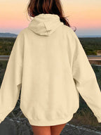 Light cream dropped-shoulder hoodie back view with drawstring hood