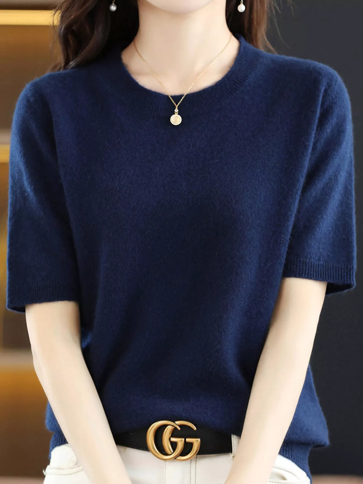 Navy round-neck short-sleeve knit sweater with ribbed neckline and straight hem