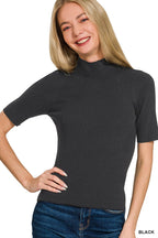 Black ribbed mock-neck short-sleeve sweater top, side view