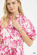 Pink abstract print midi dress with smocked neckline and gathered tie waist detail