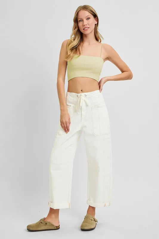 Cream high-rise cropped wide-leg cargo jeans with drawstring waist and patch pockets