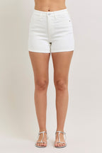 White high-waisted denim shorts, slim fit, front view, cuffed hem.