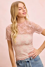 Dusty rose sheer mesh high-neck top with short sleeves and bow motif embroidered lace.