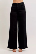 High-waisted wide-leg black denim jeans with front button and zipper, relaxed fit