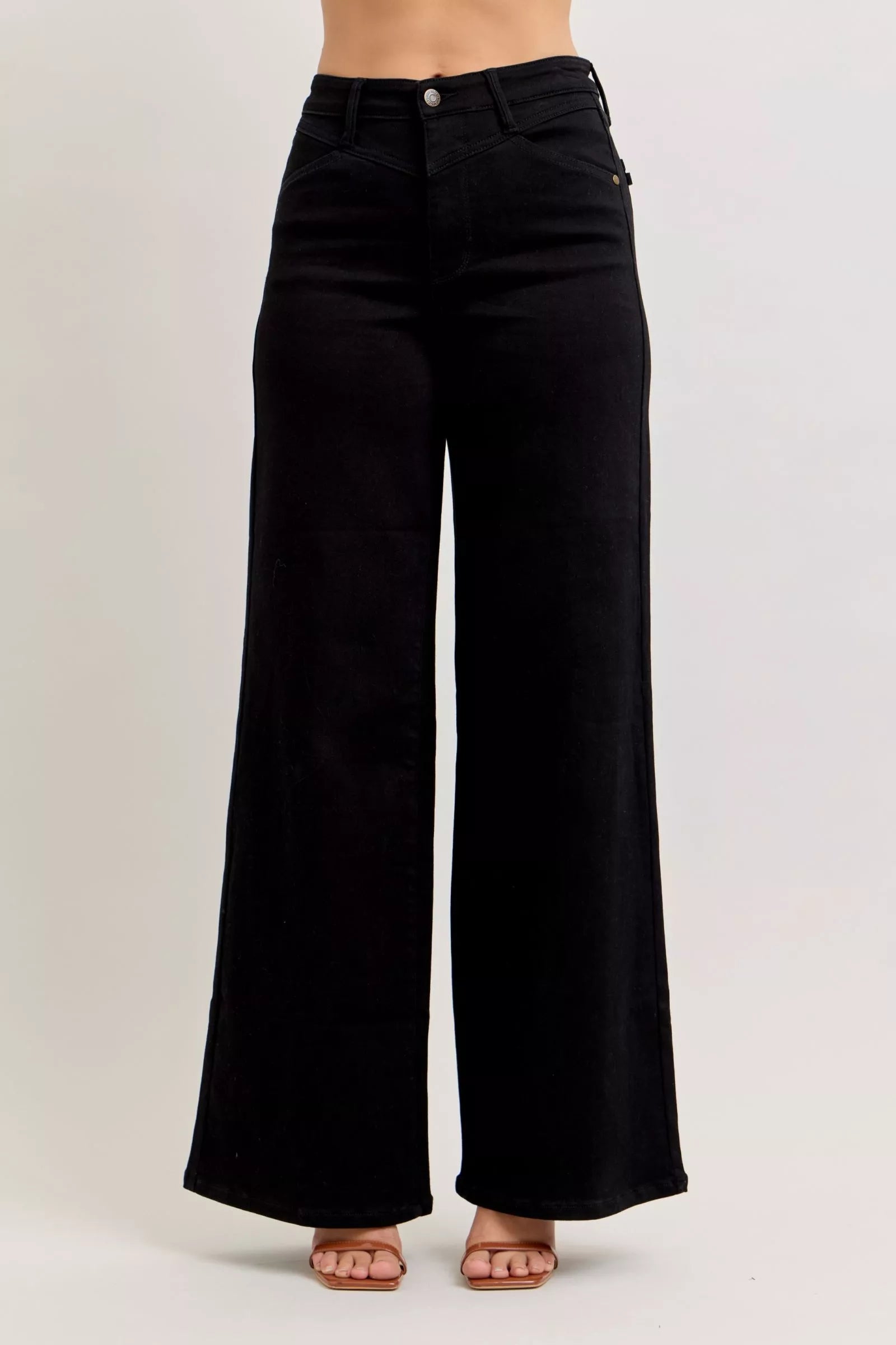 High-waisted wide-leg black denim jeans with front button and zipper, relaxed fit