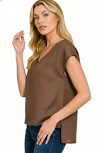 Brown linen V-neck sleeveless top with relaxed drape