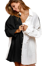 Women's oversized color block button-up shirt in black and ivory, front view