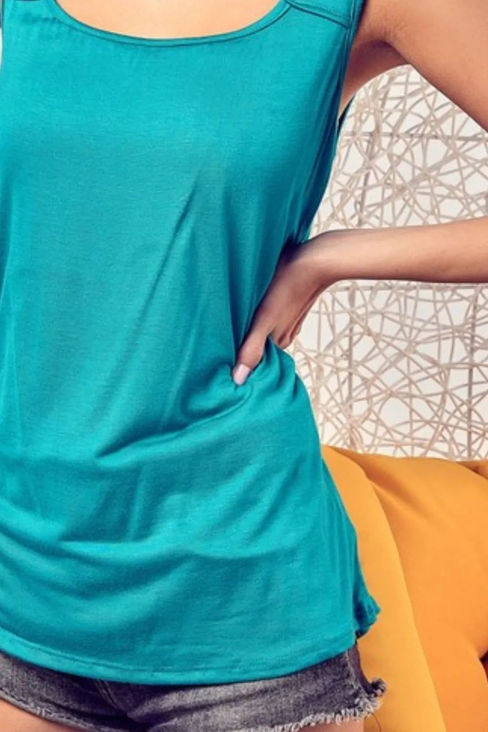 BiBi Rayon Span Knit With Cut Out Front Sleeveless Top