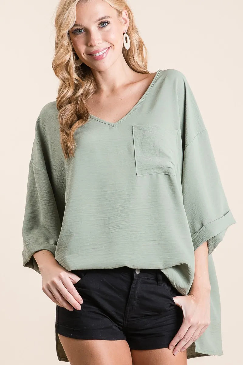 Sage Green Oversized V-Neck Blouse – High-Low Hem & Chest Pocket