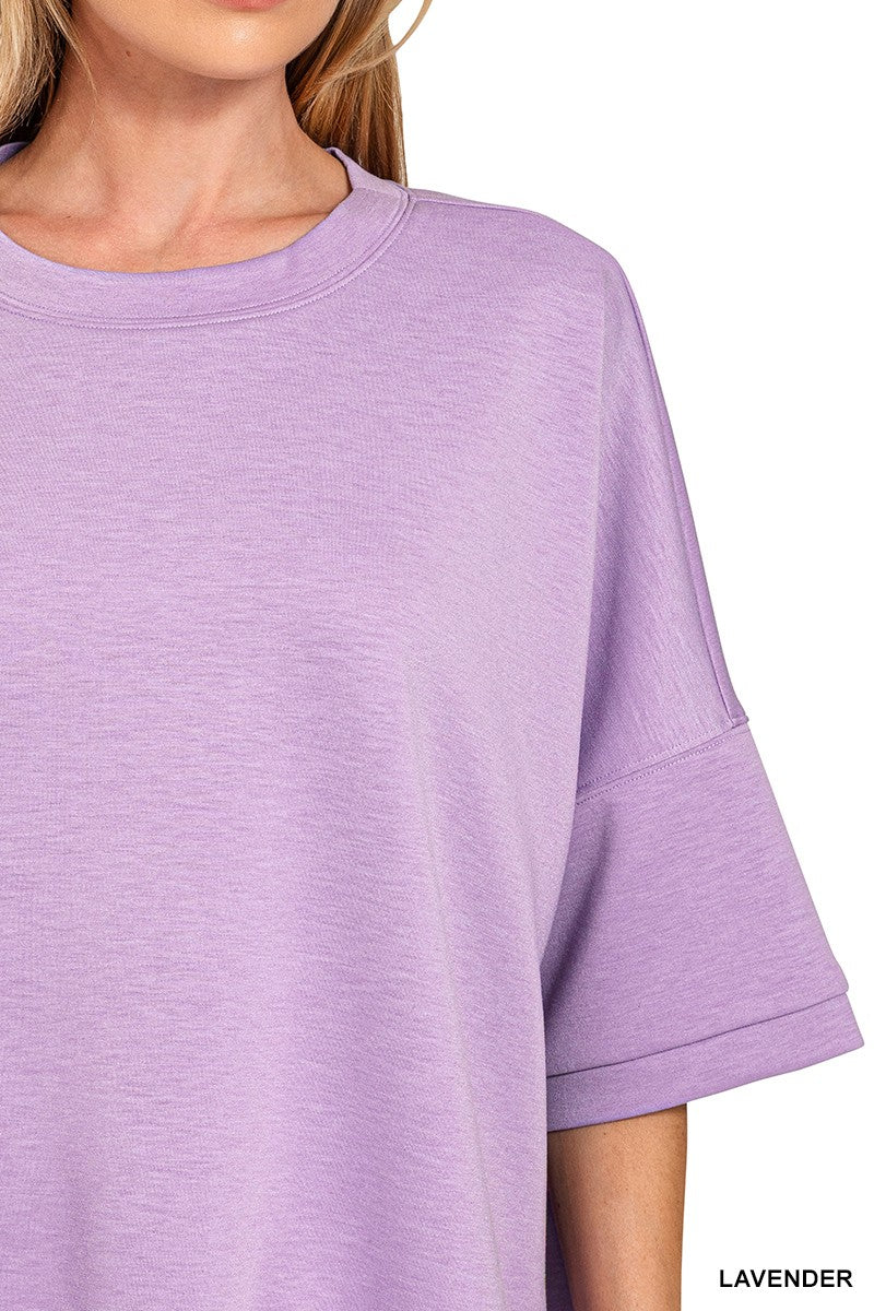 Lavender scuba top close-up with round neckline and short sleeves