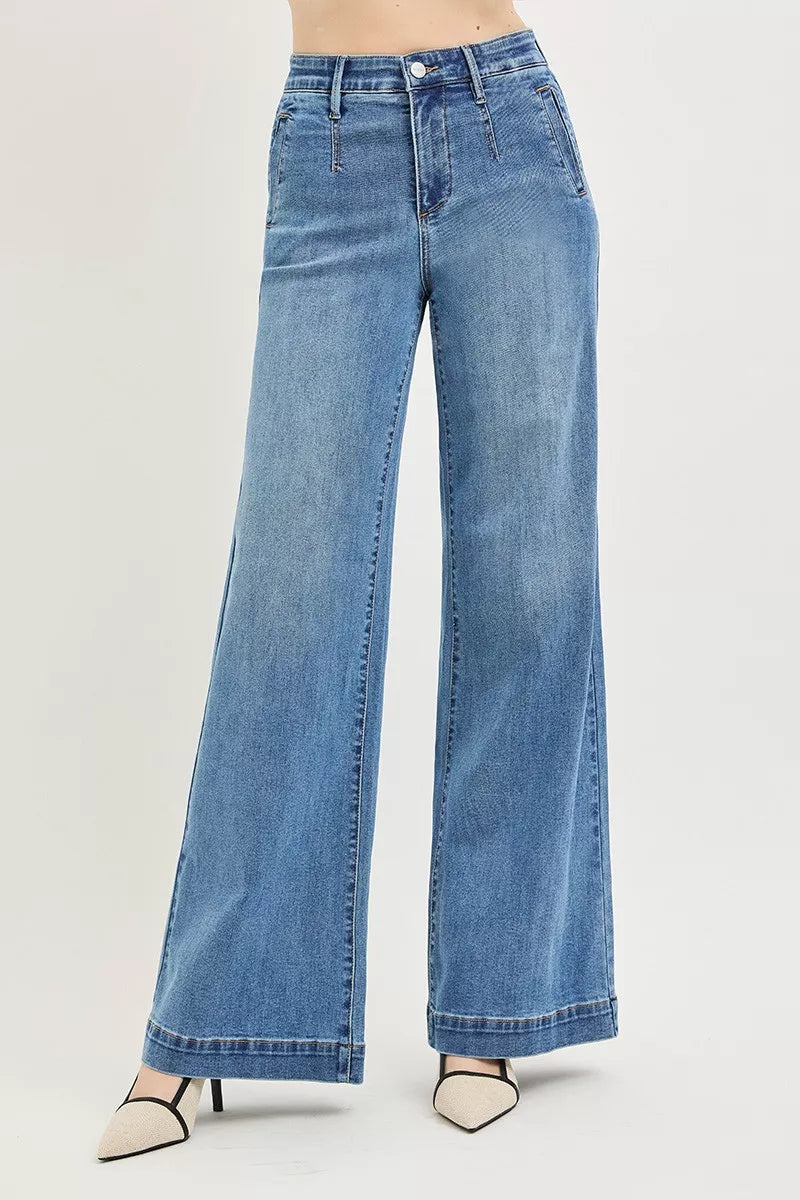 Medium-wash high-rise wide-leg jeans, five-pocket, button-zip closure.