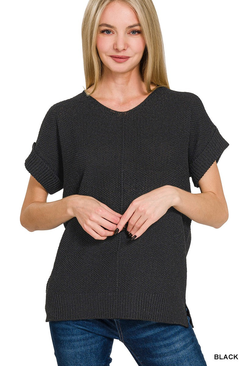 Black ribbed knit top with center seam, short sleeves and crew neckline