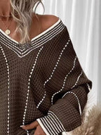 Brown V-neck textured knit sweater with white vertical stripes and ribbed cuff