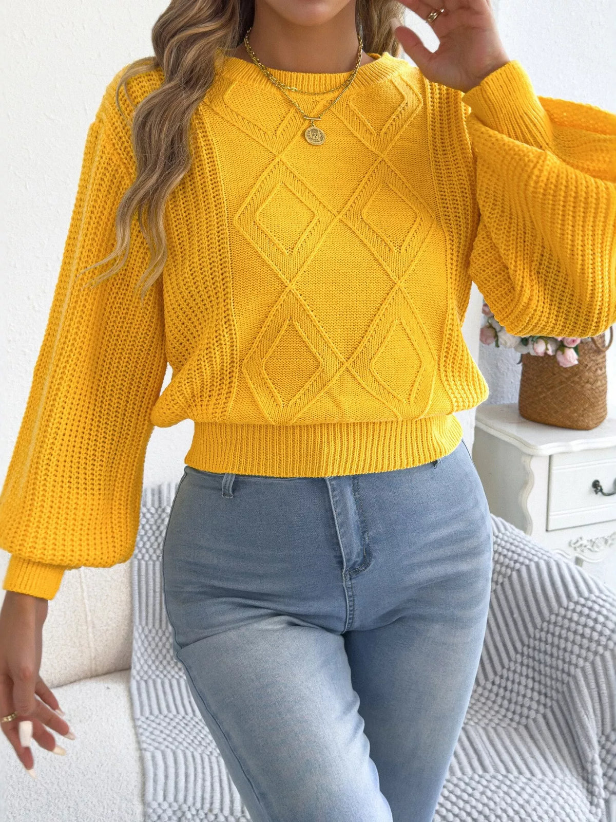 Yellow argyle lantern-sleeve sweater with crew neck and ribbed hem