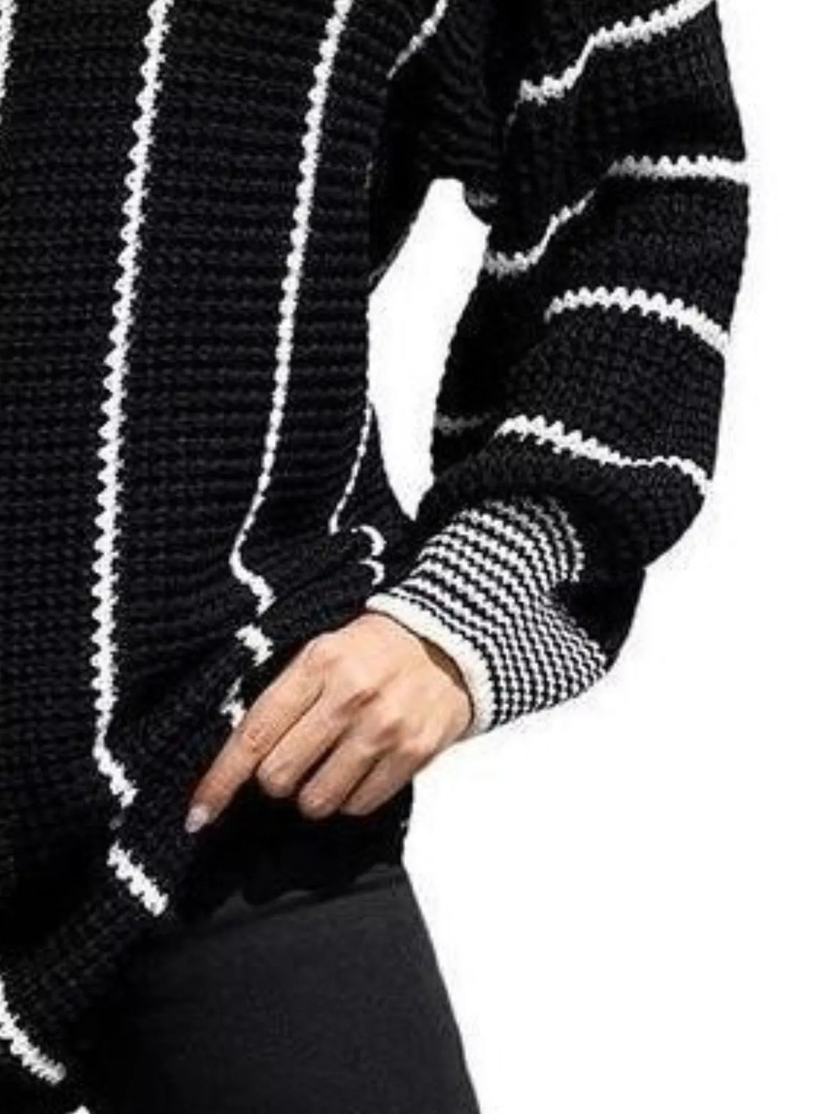 Black textured knit sweater sleeve with white striped ribbed cuff detail