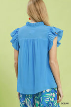Ocean blue smocked yoke ruffle cap sleeve blouse, back view