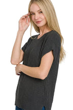 Black ribbed knit top with center seam, crew neck, short sleeves